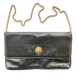 Leather black clutch with gold chain and lion head